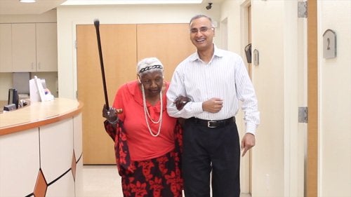 Ms. Dorothy Graham walking with Dr. Reddy